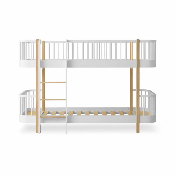 Sofa bed in white and natural wood with two bunk beds and a ladder.